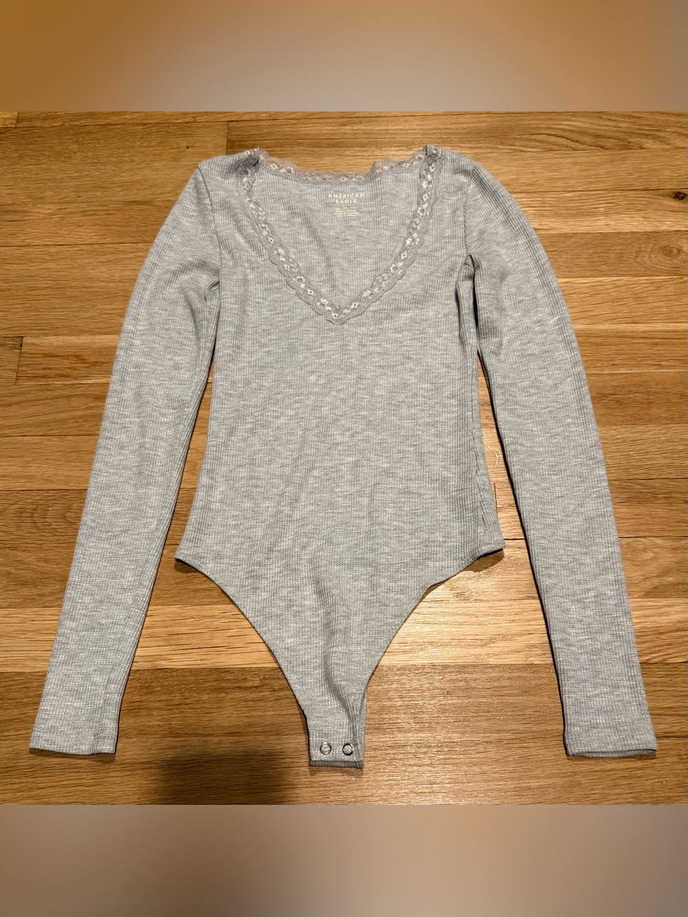 EUC America Eagle Thermal Waffle Knit Lace Trim V Neck Bodysuit